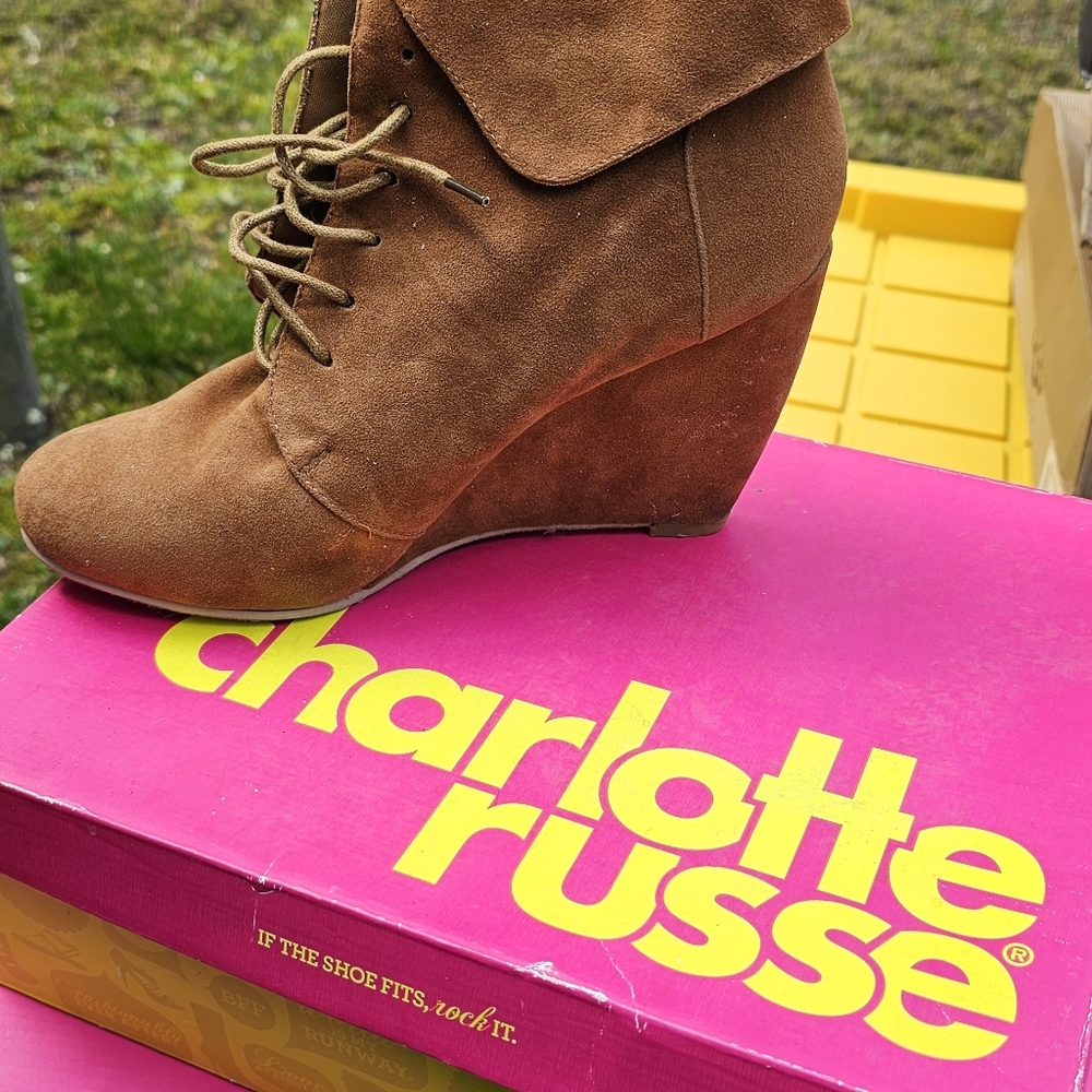 Size 9 booties brand names. some barley used and some brand new